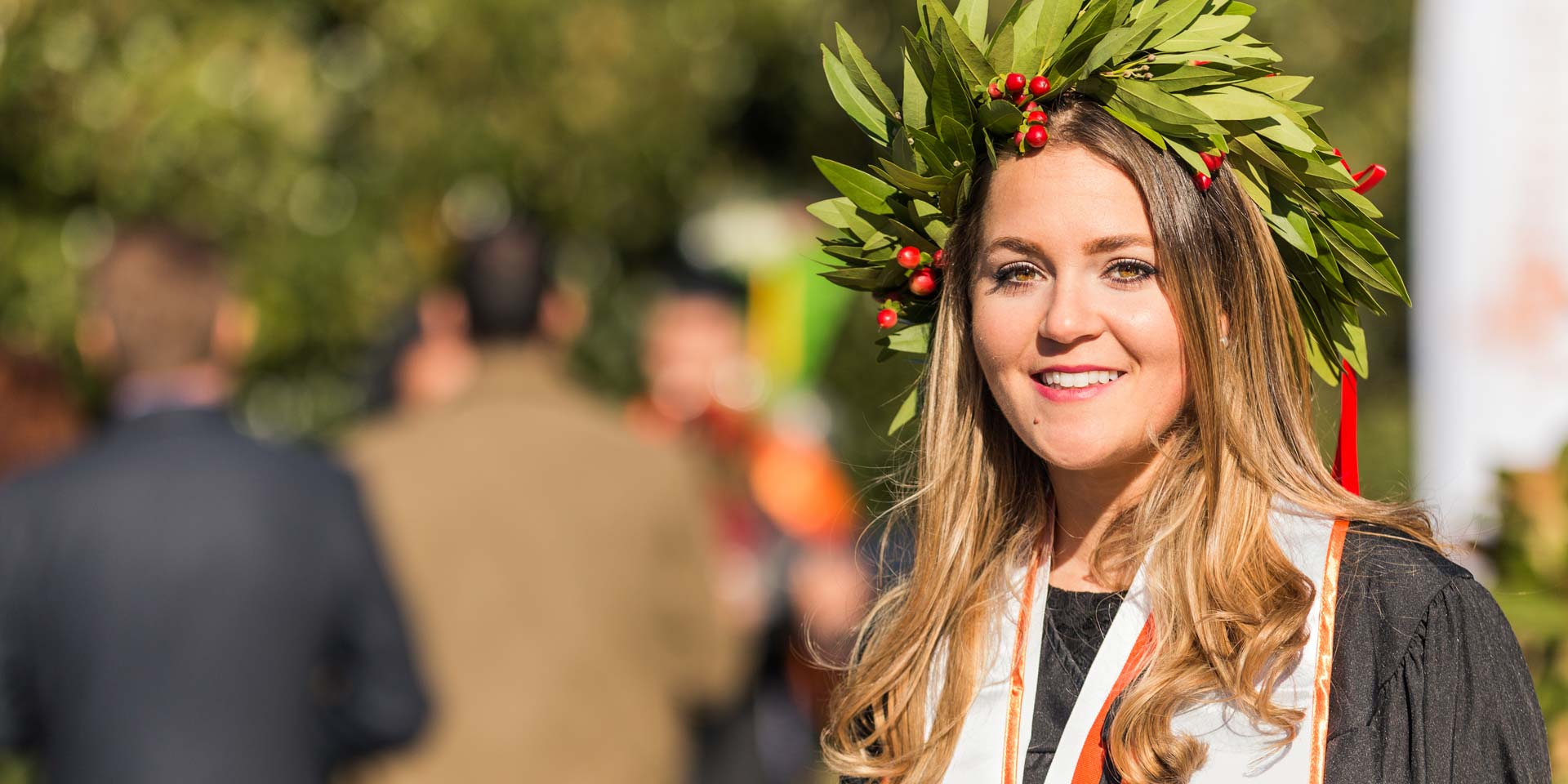 Marketing graduate Chiara Zamboni donned a headpiece with special meaning in her home country of Italy. The crown made of bay leaves and berries represents victory and success.